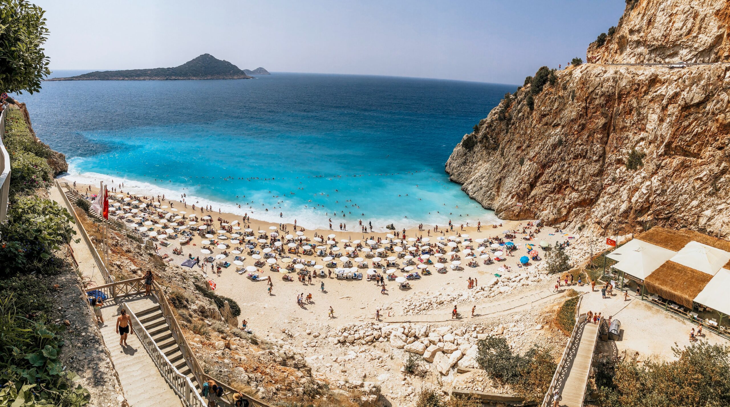 Beach with people enjoying.