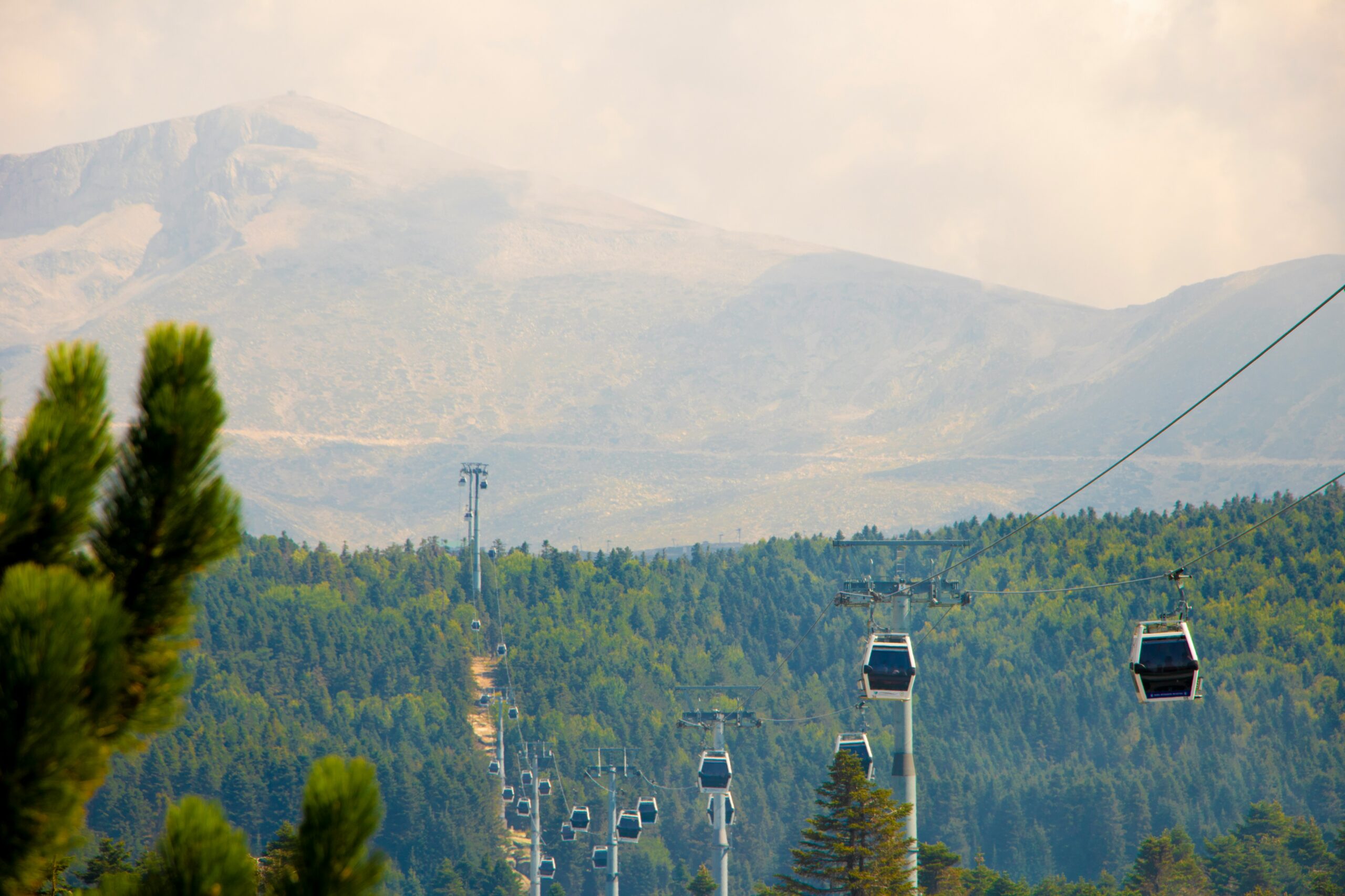 Black cable cars on mountains at daytime. Bursa Teleferik. Turkey