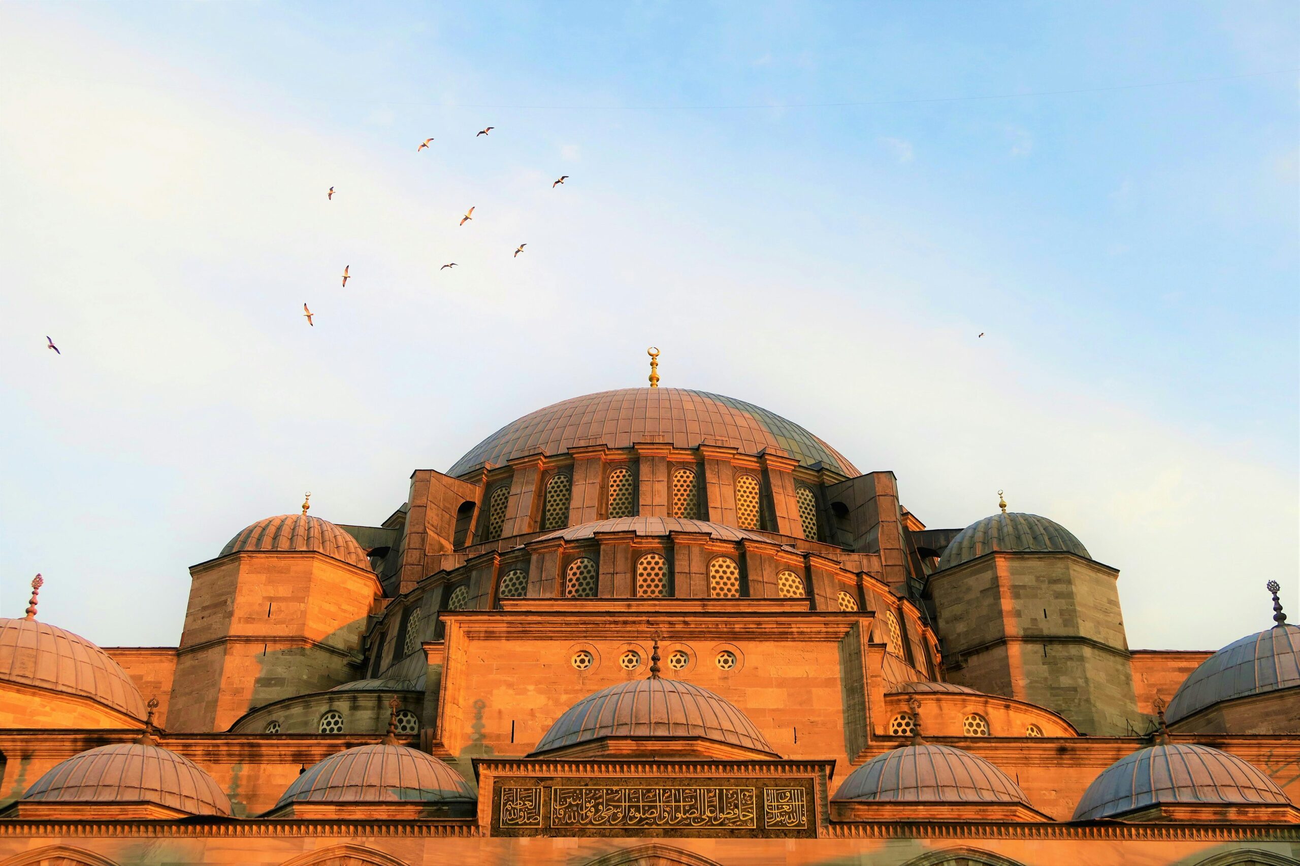 Photo of concrete brown dome building.
A mosque in Istanbul, Turkey.