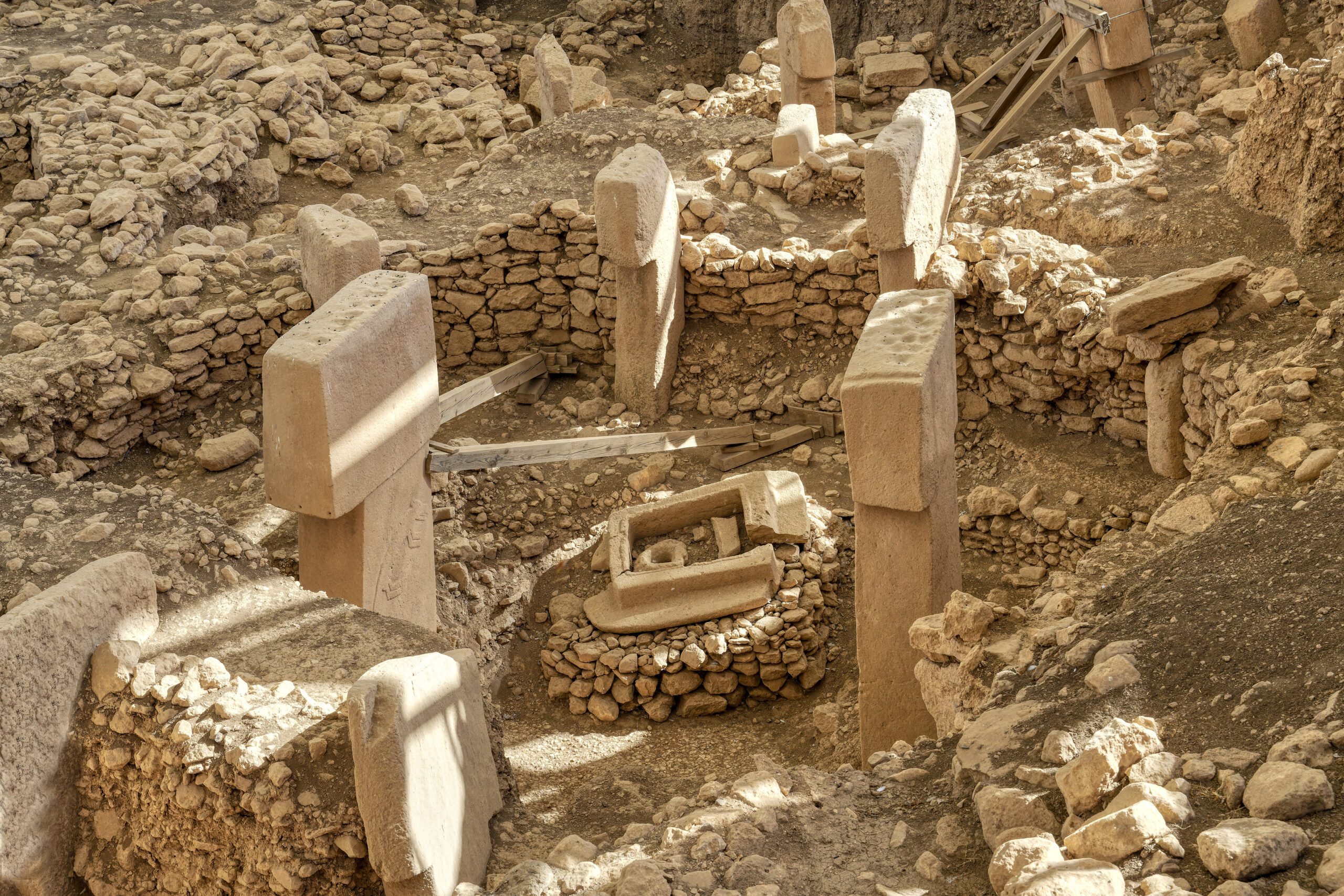 - Turkey Family Holidays Gobekli Tepe neolithic archaeological site dating from 10 millennium BC, Large circular structures with massive stone pillars, Potbelly Hill, Sanliurfa, Turkey