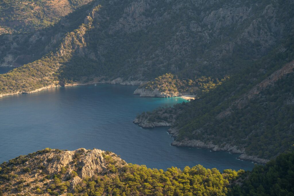 Body of water surrounded by Mountains